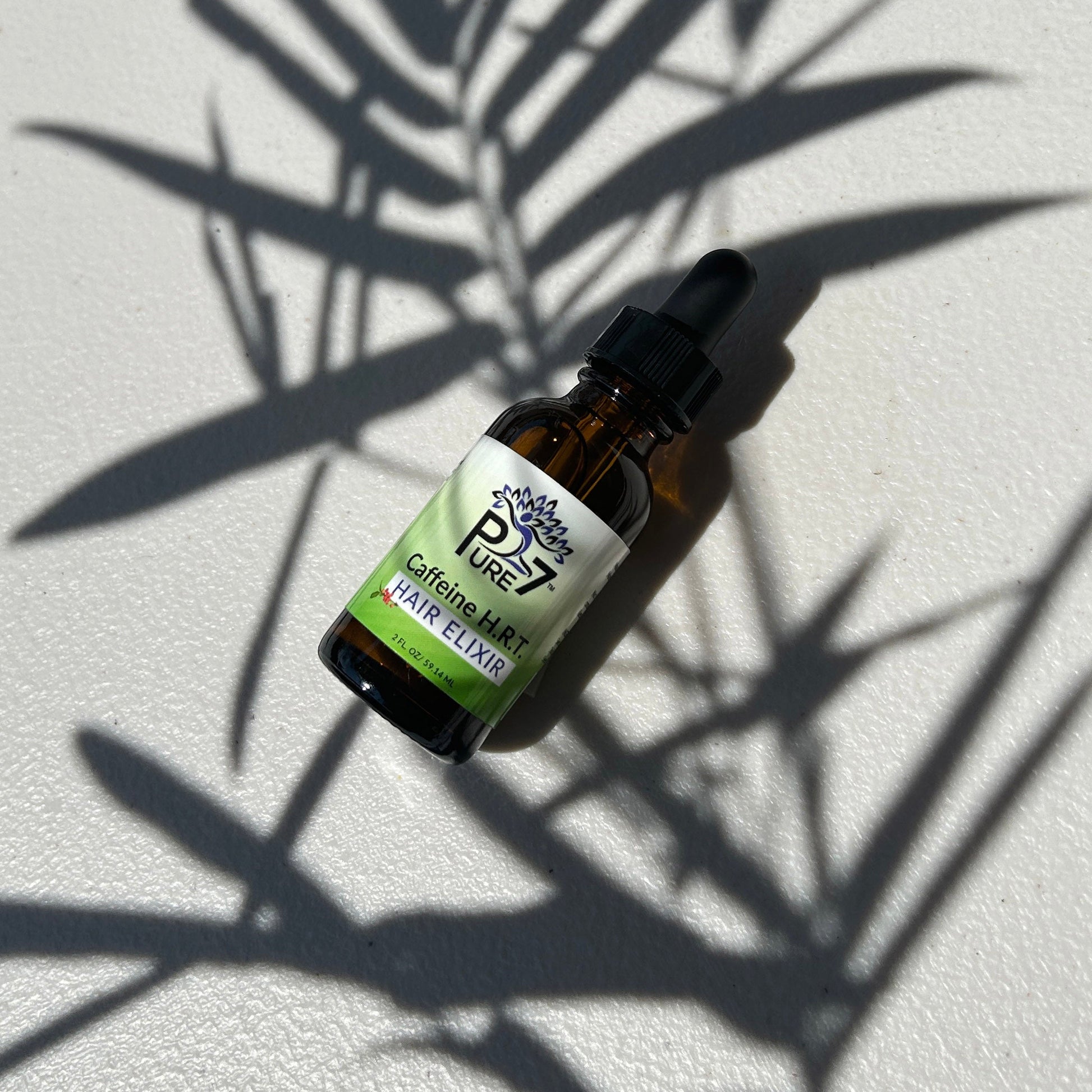 Natural coffee-infused hair and skin elixir for thinning hair and scalp health